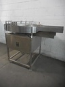 Stainless steel acomulating table.