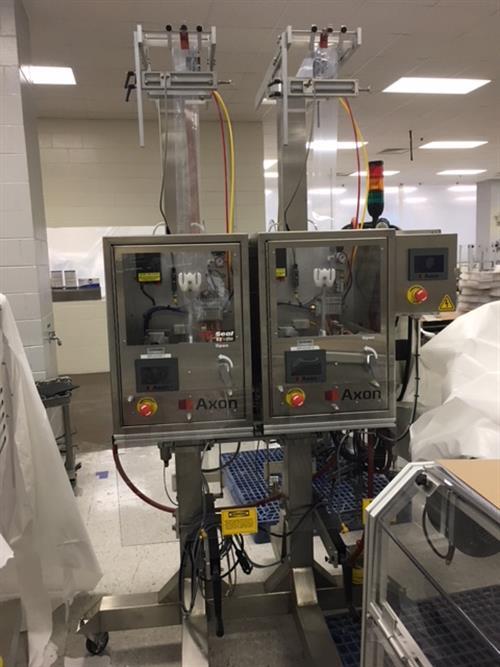 (2) Axon EZ-200HS shrink sleevers with (2) Axon model EZ-SRB8 Heat Shrink Tunnels