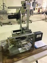 Universal model R-310 Table top wrapaound labeler