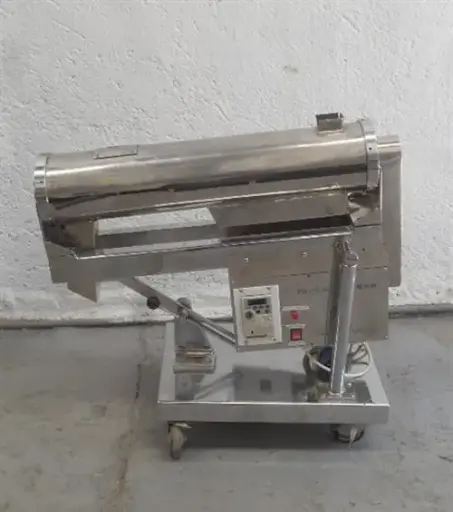 [M11049] Model PG-7000 stainless steel capsule deduster.