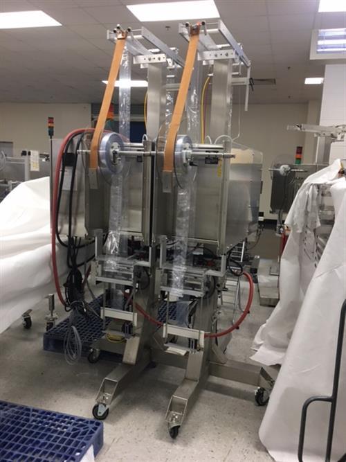 (2) Axon EZ-200HS shrink sleevers with (2) Axon model EZ-SRB8 Heat Shrink Tunnels