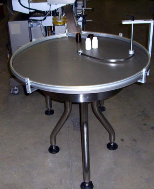 NEW CVC model 700 accumulating table