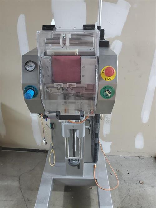CVC model 1103 Pouch Desiccant Inserter