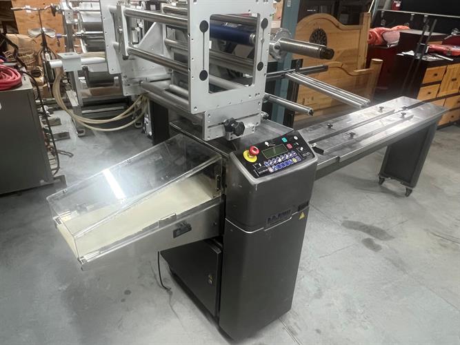 CVC model 300CL Wraparound Labeler