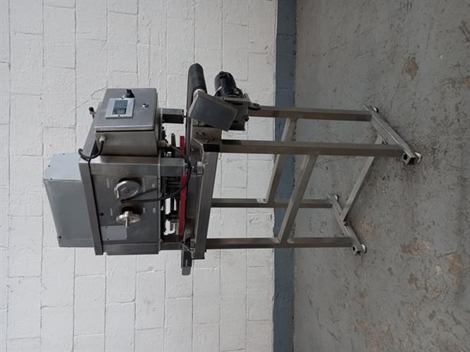 Newman model 5CT spindle torquer capper