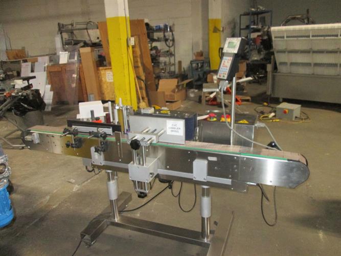 Used CVC 300 Pressure Sensitive wraparound Labeler with Coder