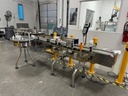 CVC model 300 wraparound pressure sensitive labeler with 28&quot; accumulating table