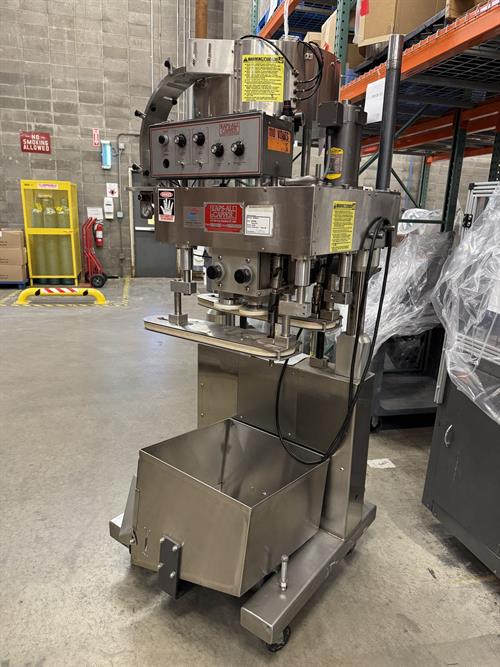 Kaps-All model E 4 spindle capper