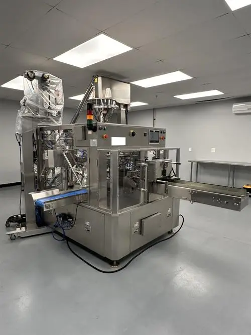 New Genesis Pre-Made Rotary Bagger With Auger Filler And Desiccant & Pouch Feeders