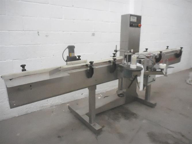 Equiteck stailess steel wraparound labeler.