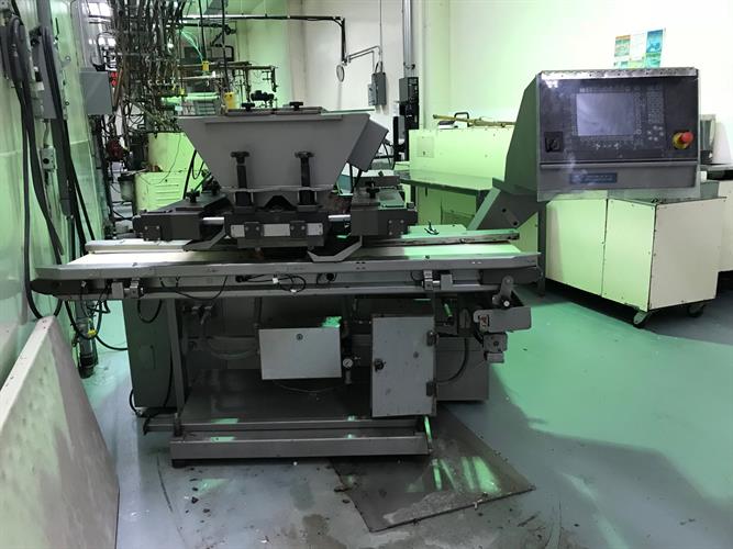 Knobel model CCM-12/24-45-CAD One-Shot Depositor