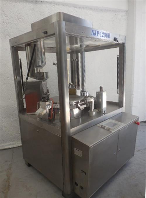 CIMA model NJP-1200B stainless steel capsule filler.