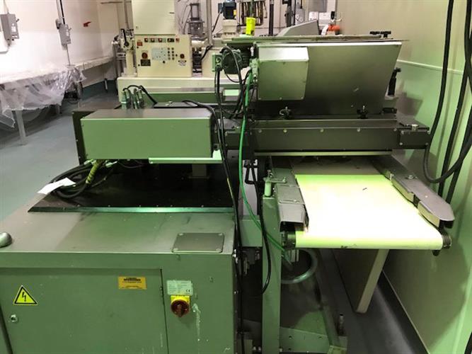Knobel model CCM-12/24-45-CAD One-Shot Depositor