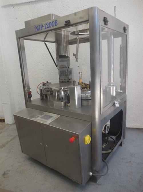 CIMA model NJP-1200B stainless steel capsule filler.