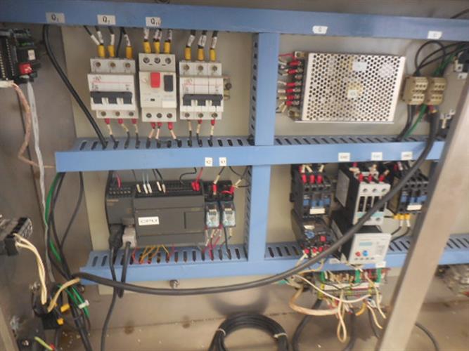 CIMA model NJP-1200B stainless steel capsule filler.