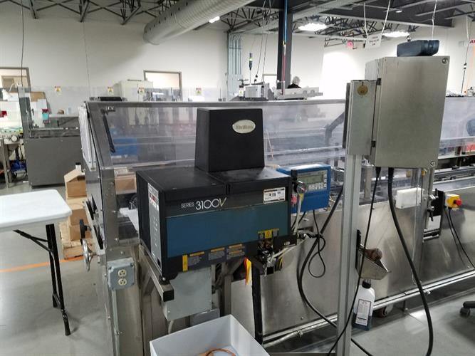 Econocorp Econoseal model ECM-7701 Horizontal Load Cartoner