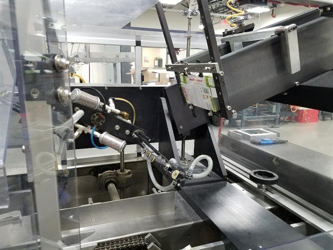 Econocorp Econoseal model ECM-7701 Horizontal Load Cartoner